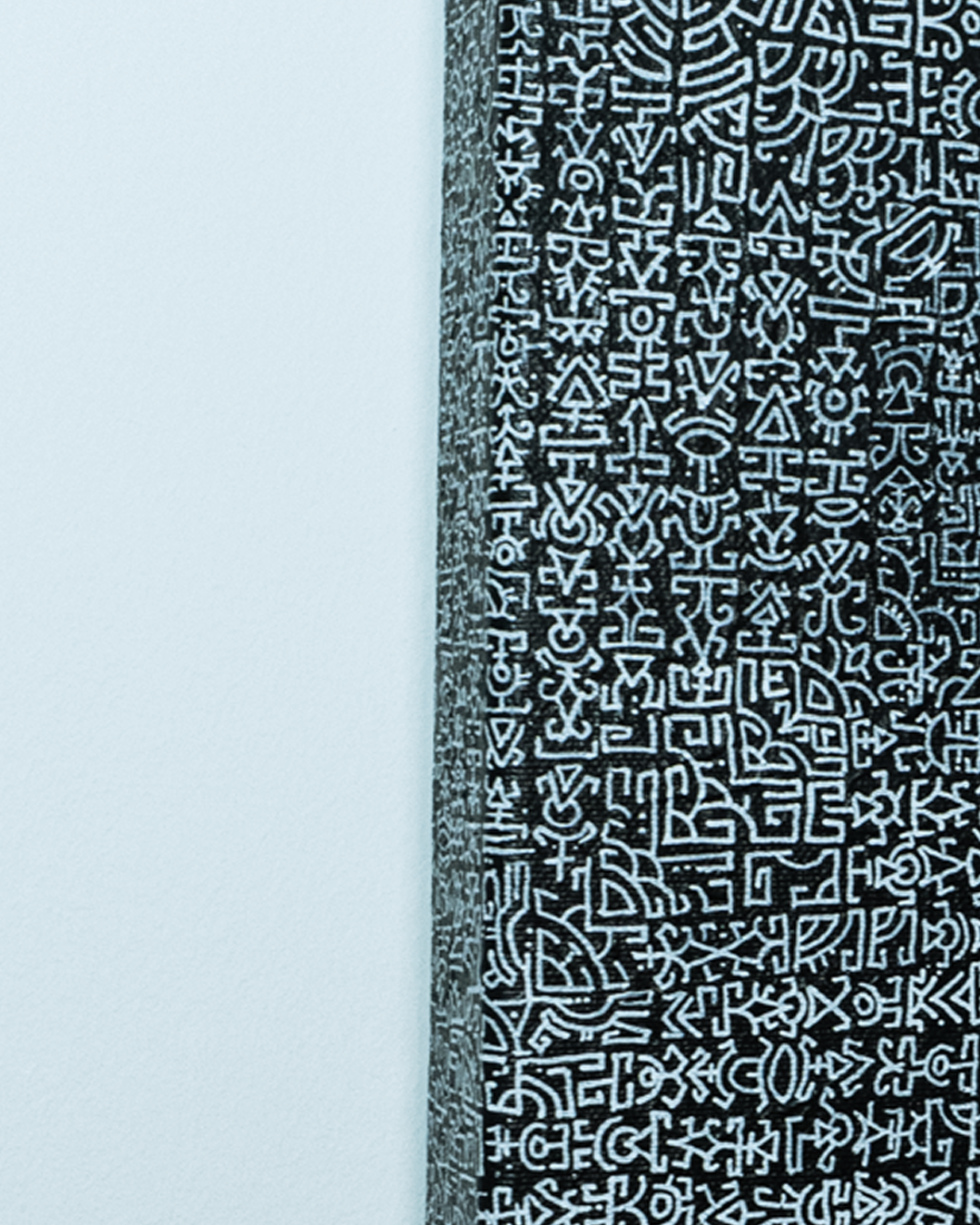 Textile with a geometric pattern on a light blue background